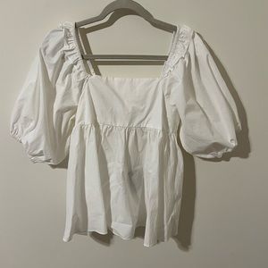 Bubble sleeve white blouse. Ties in the back
